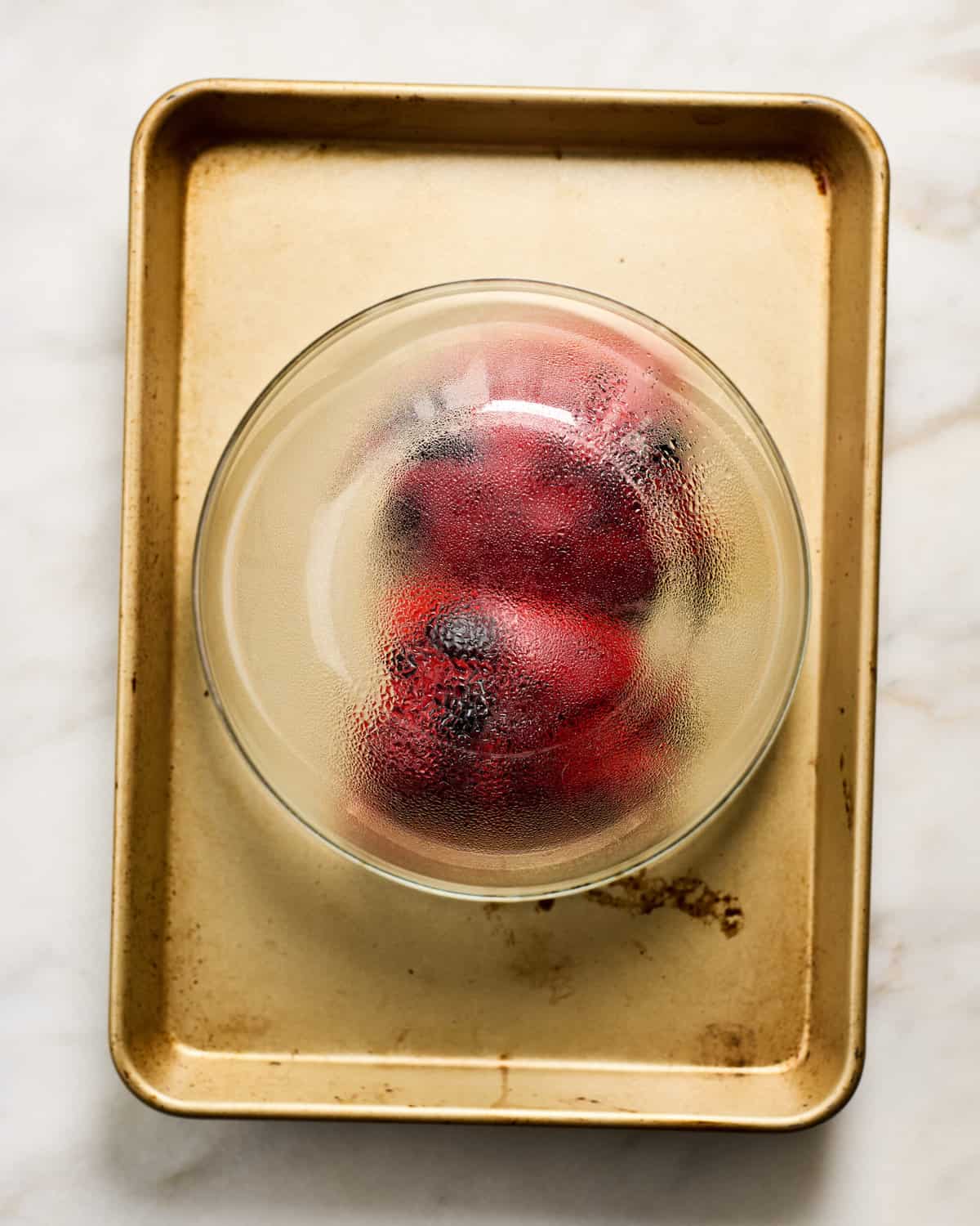 Steaming the red bell pepper.