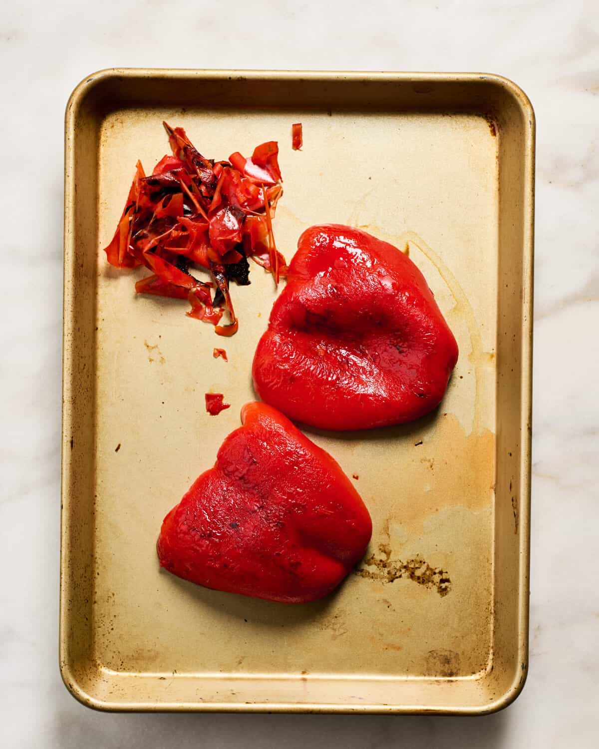 Peeling the red bell pepper.
