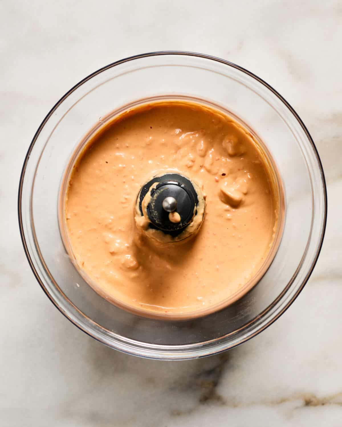 Making red pepper hummus.