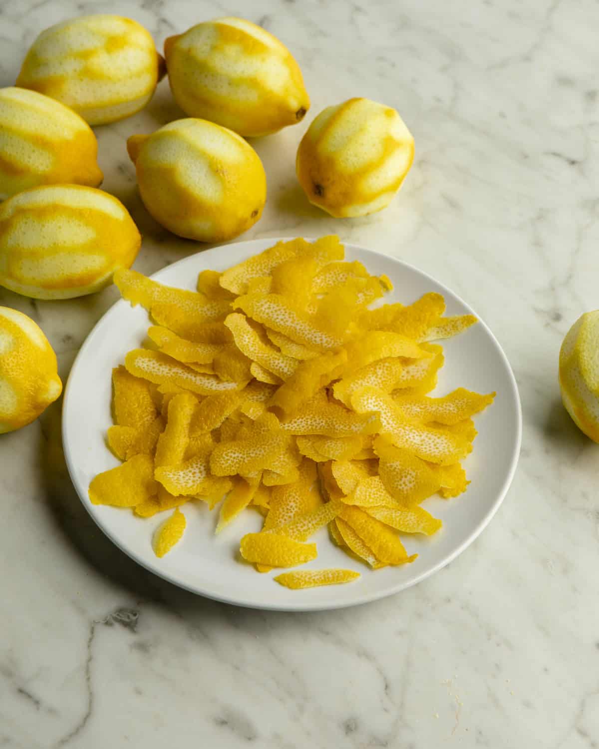 Lemons peeled on a plate. 