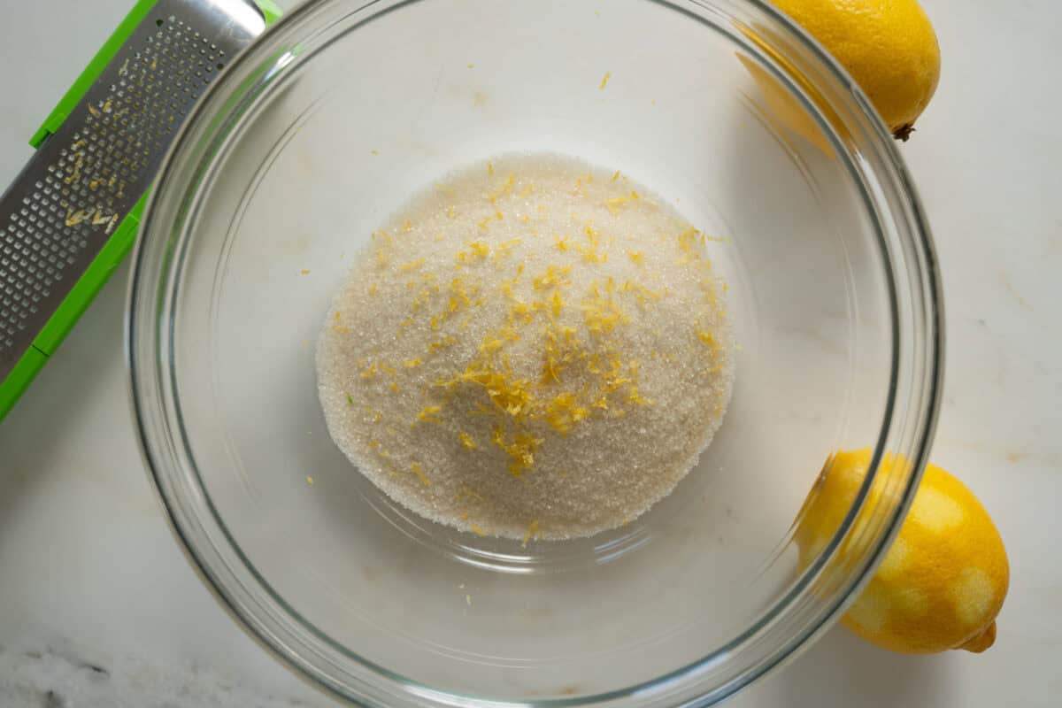 Lemon zest and sugar in a bowl. 