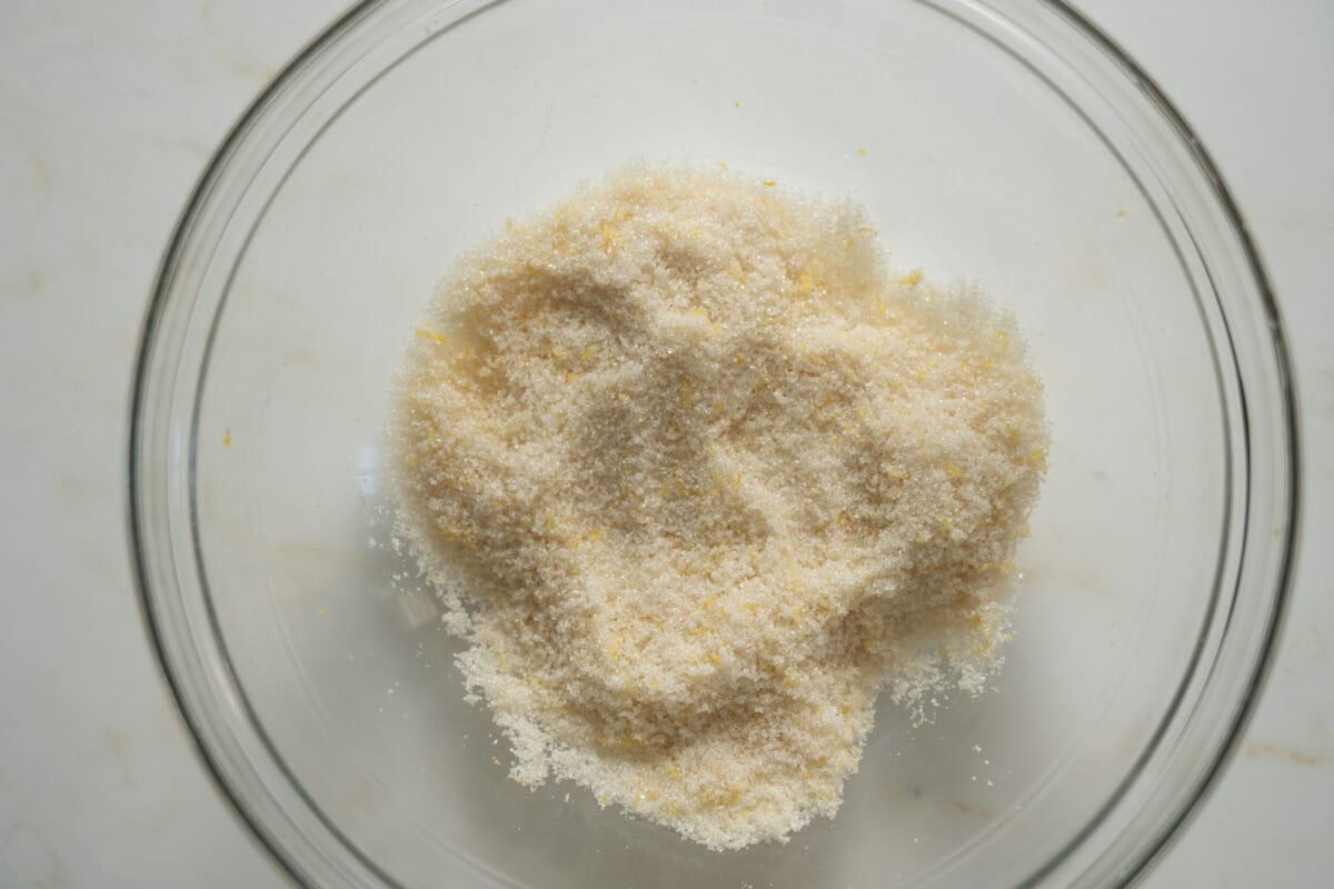 Lemon zest and sugar in a bowl. 