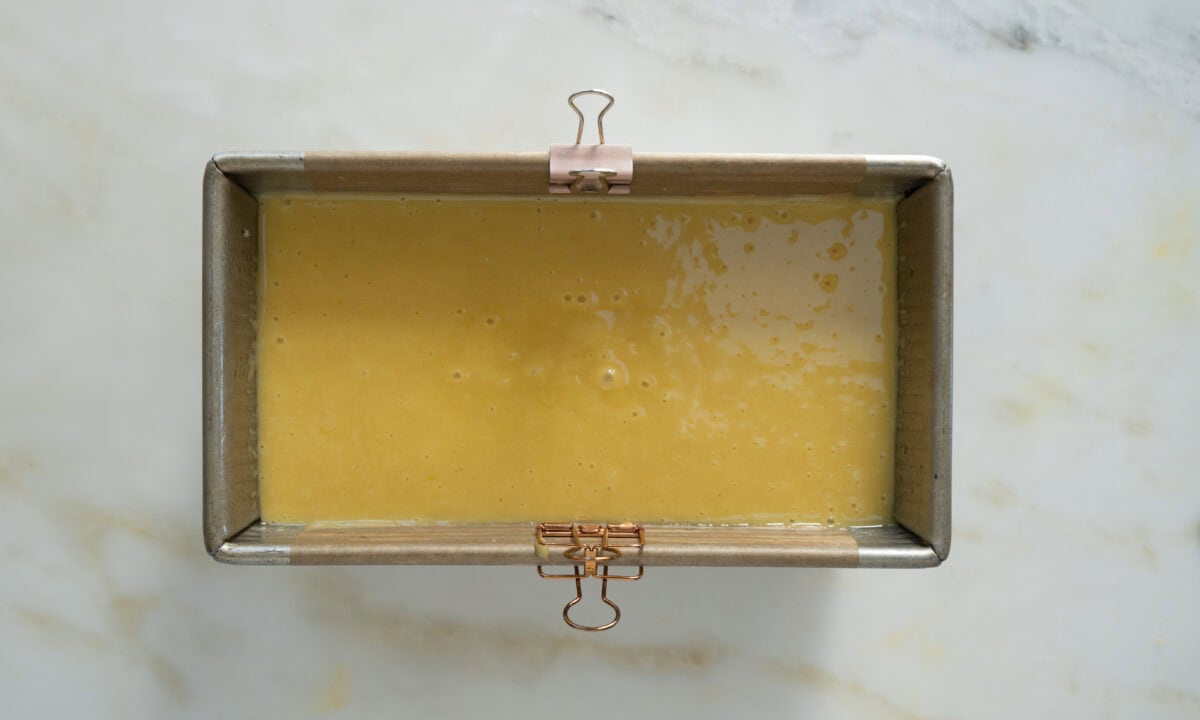 Batter added to a loaf pan. 
