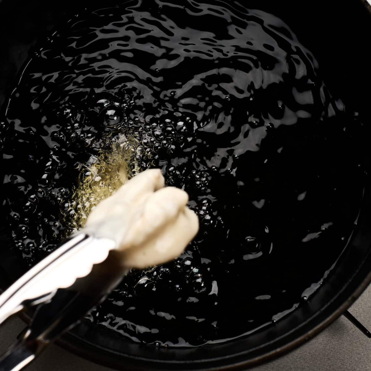 Shrimp going into hot oil. 