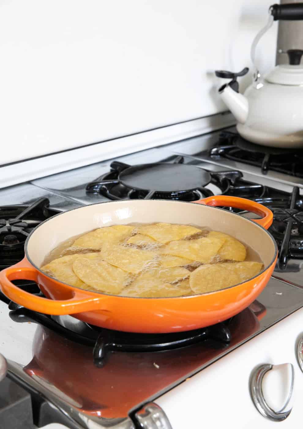 Tortillas in hot oil. 