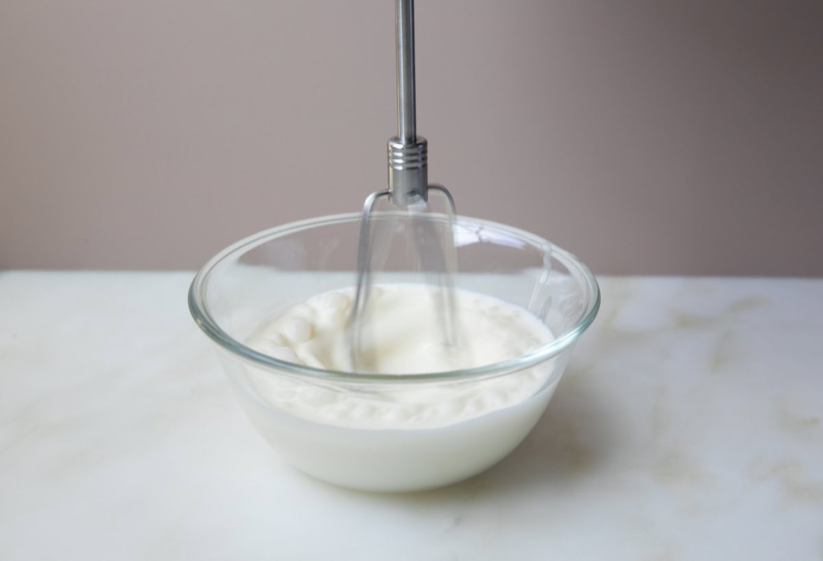 Cream top being made. 