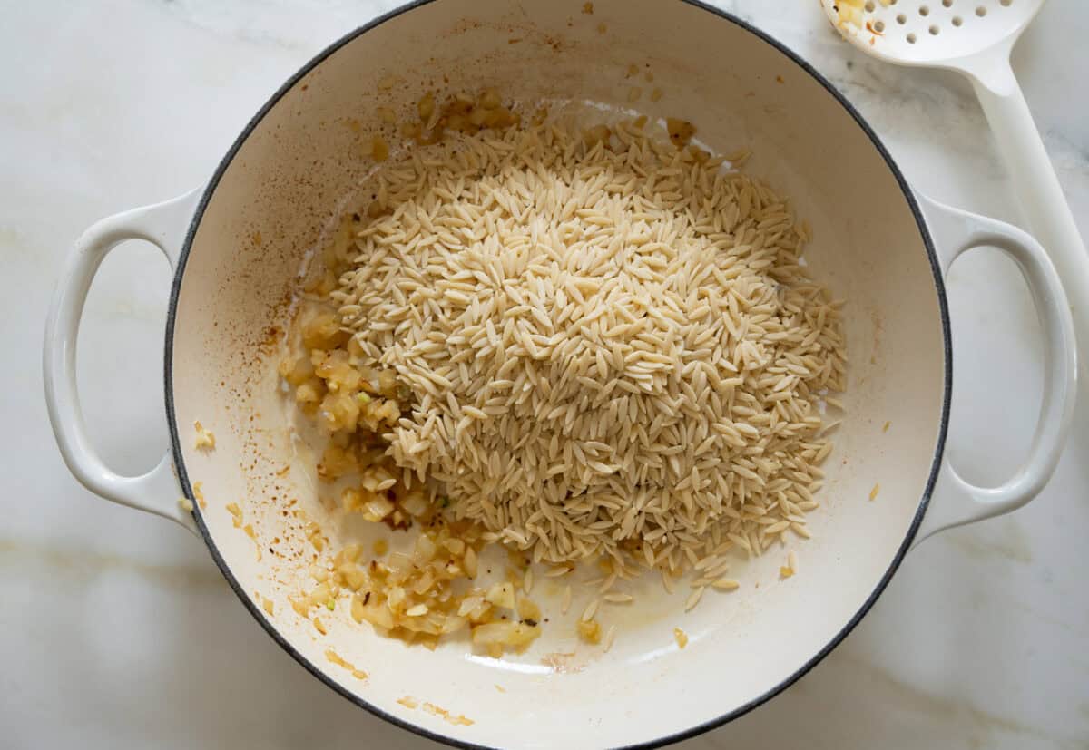 Adding in orzo. 