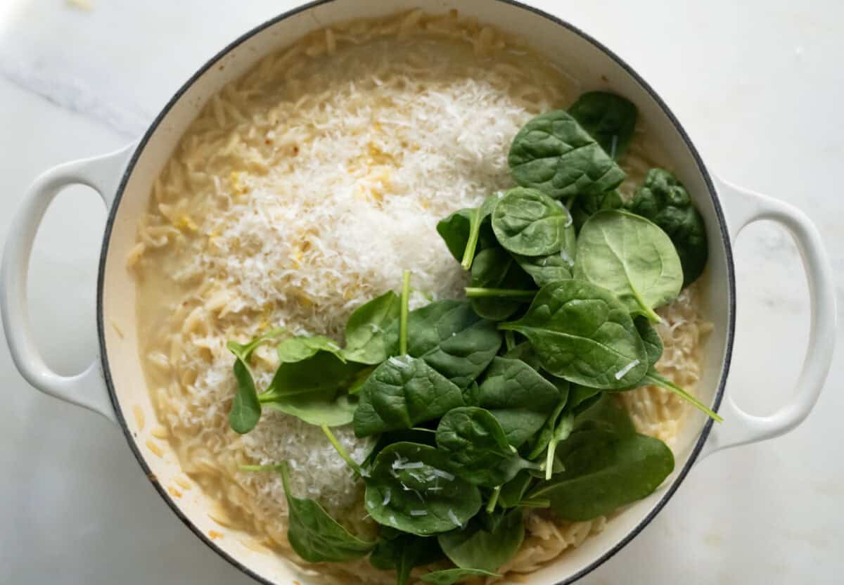Add in lemon zest, parmesan-reggiano, spinach and Italian parsley. 