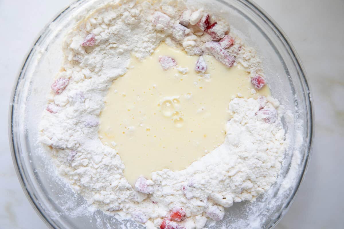 Buttermilk poured into the bowl with the dry ingredients. 