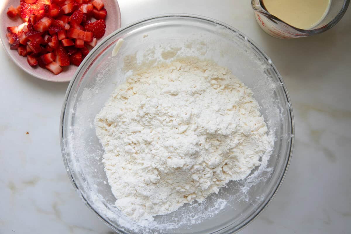 Butter being mixed through the dry ingredients. 