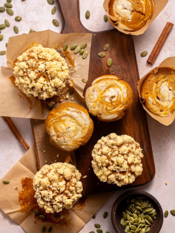 Pumpkin Cream Cheese Muffins on cutting board.