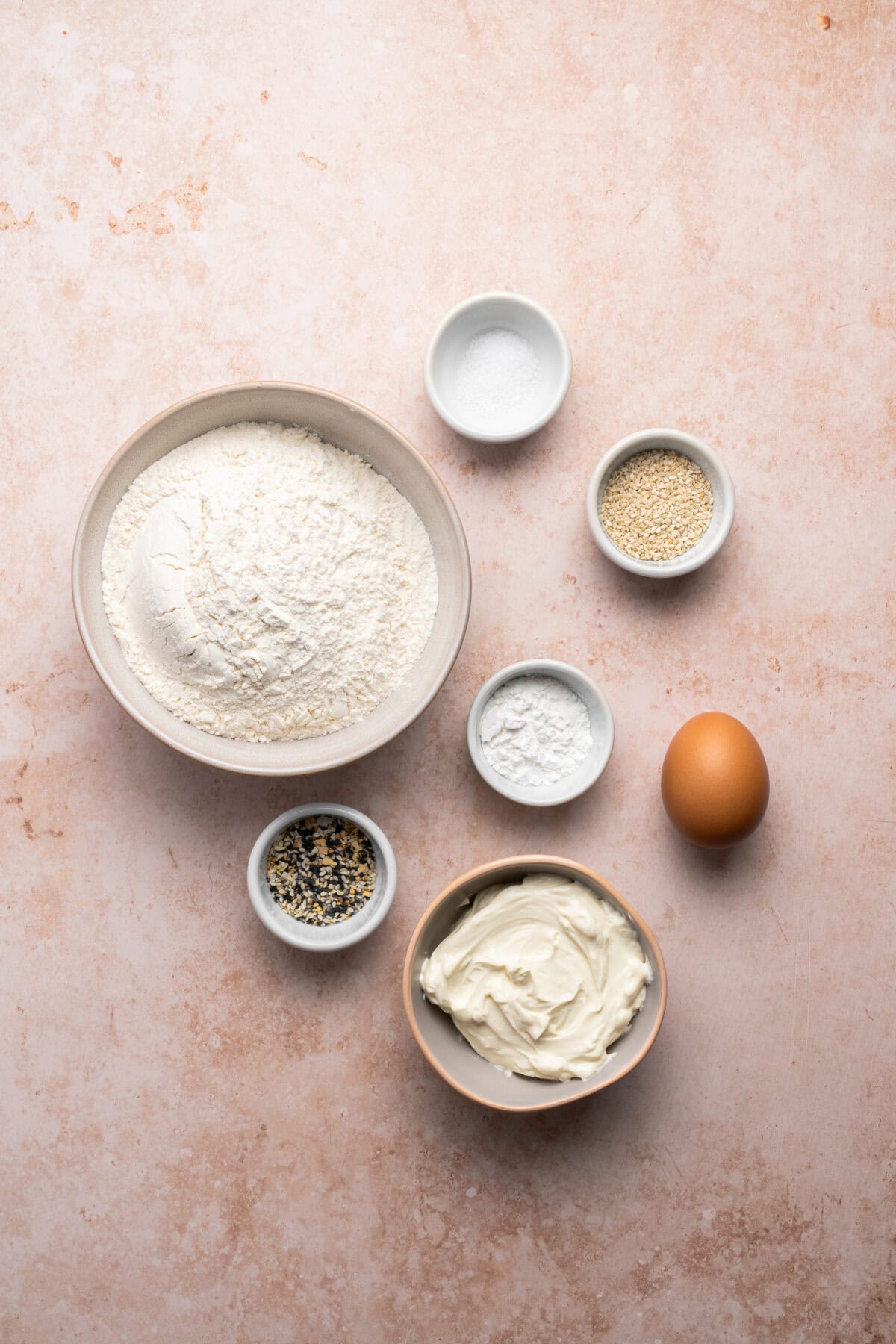 Ingredients that you'll need for Protein Bagels. All of the ingredients are in small bowls.