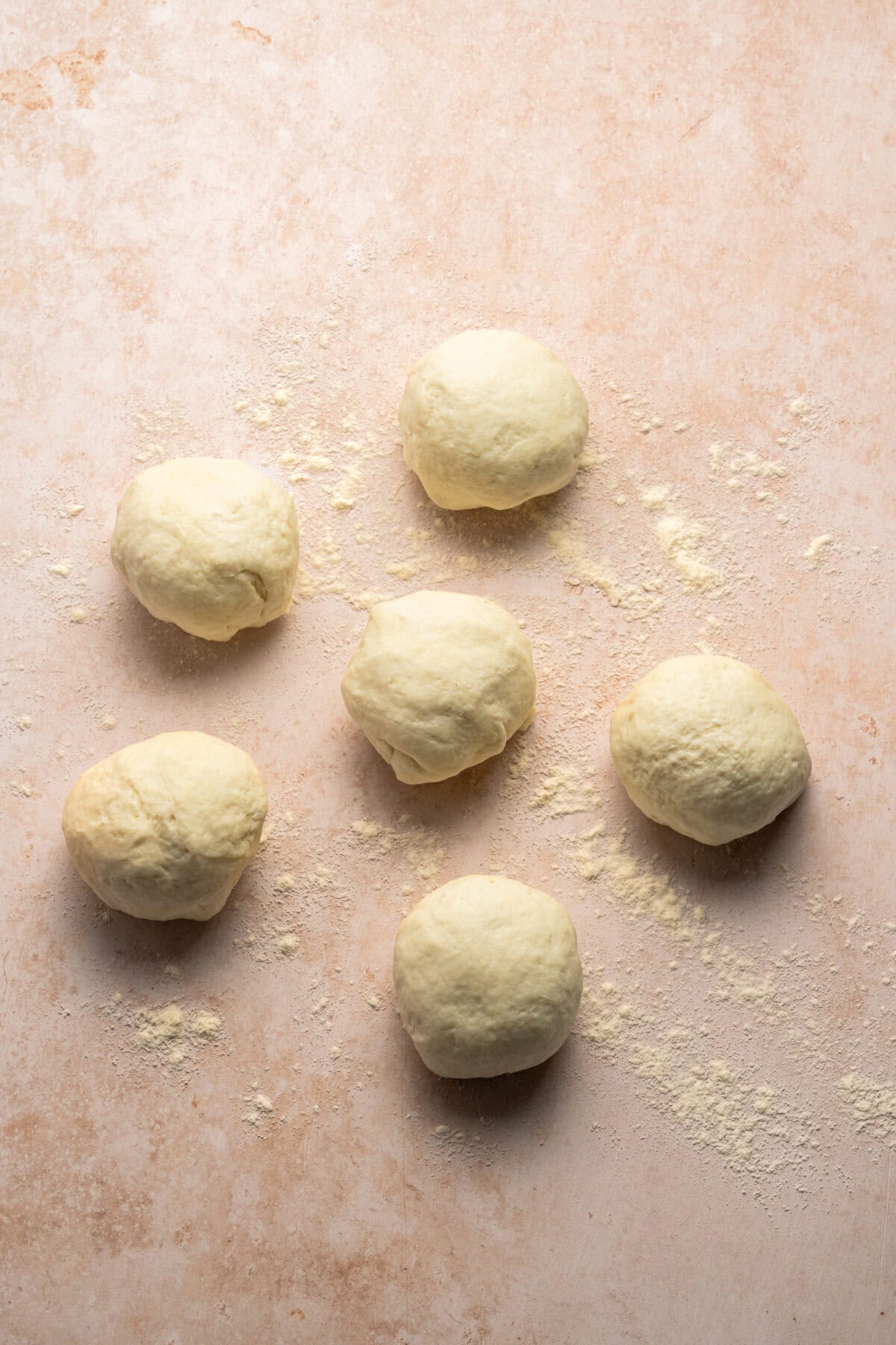 Dough broken into 8 small balls.