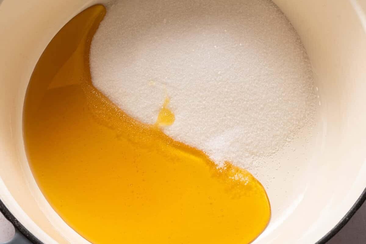 Honeycomb candy ingredients in a large pot.