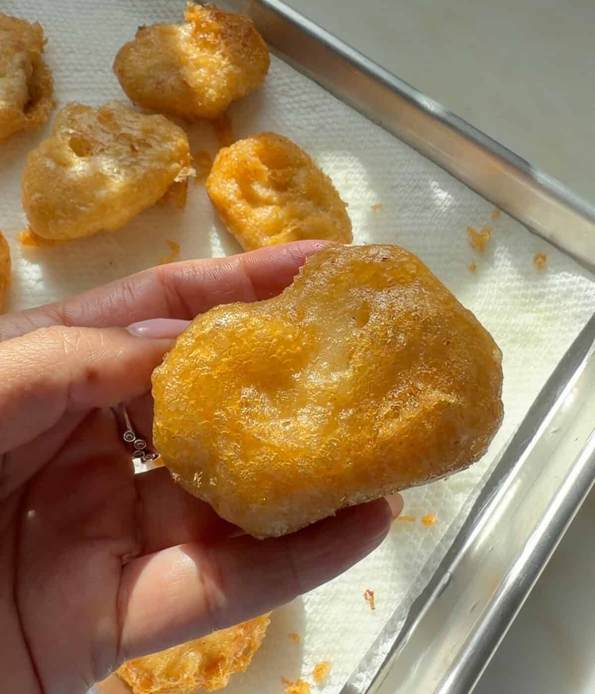 Homemade Chicken Nugget in hand.