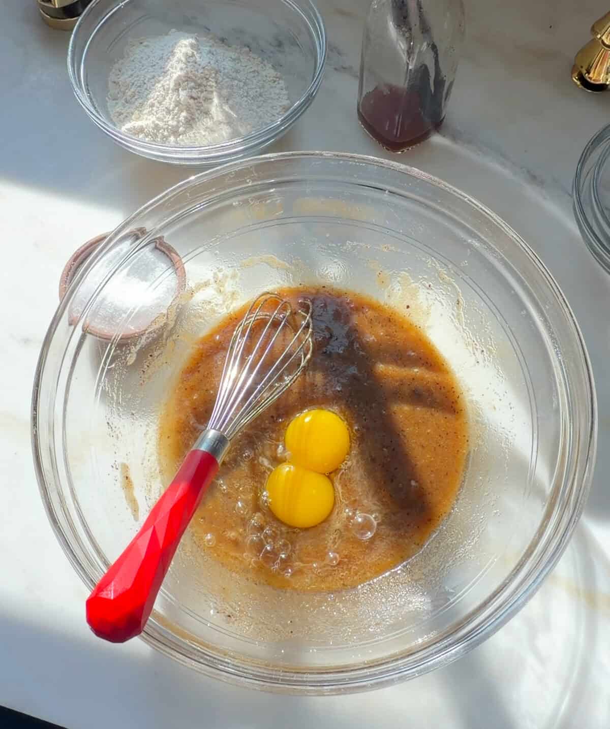Tiramisu cookies wet ingredients with whisk.
