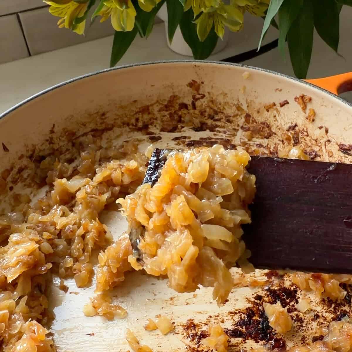 Caramelized onions on spatula.