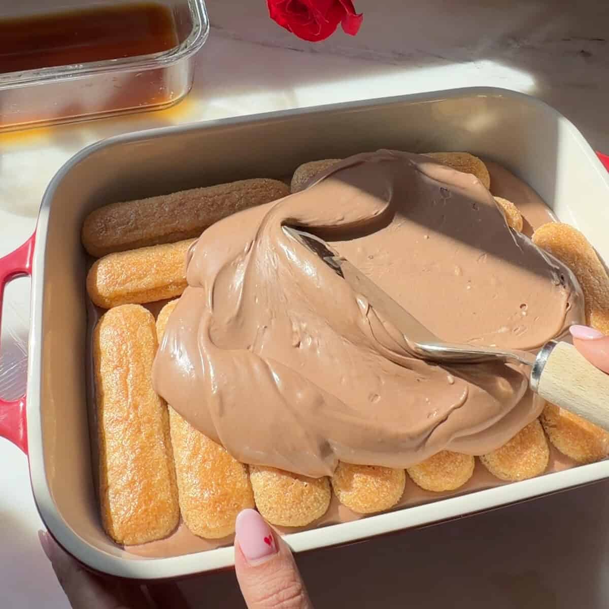 Assembling Chocolate Raspberry Tiramisu.