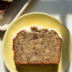 Slice of Butter Pecan Banana Bread on plate.