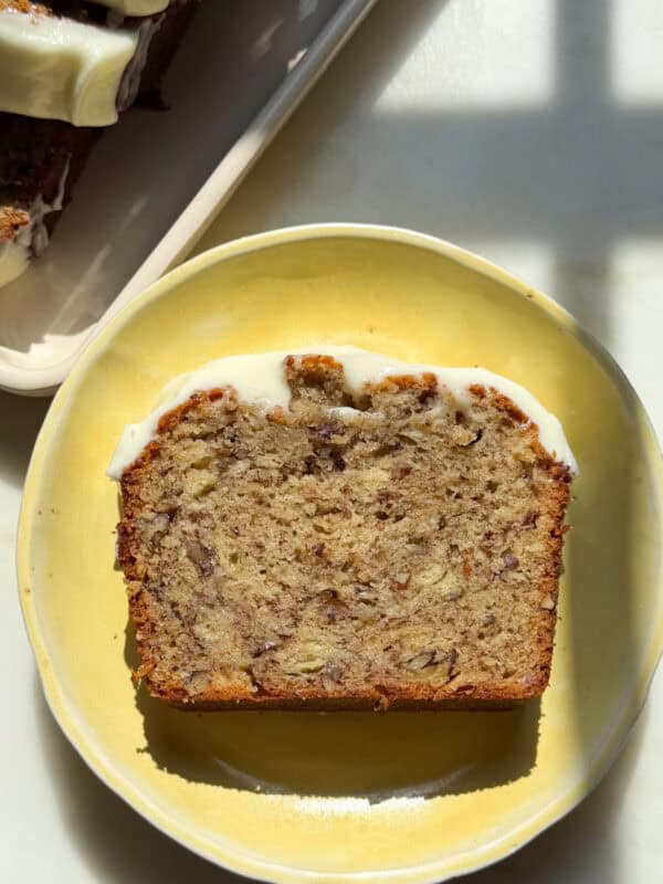 Slice of Butter Pecan Banana Bread on plate.