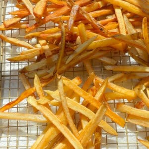 Crispy French Fries on baking sheet.