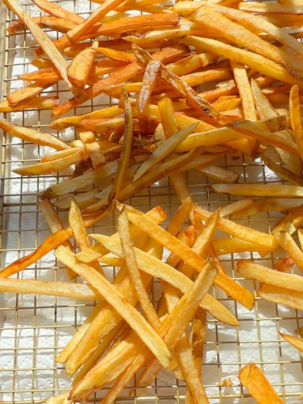 Crispy French Fries on baking sheet.