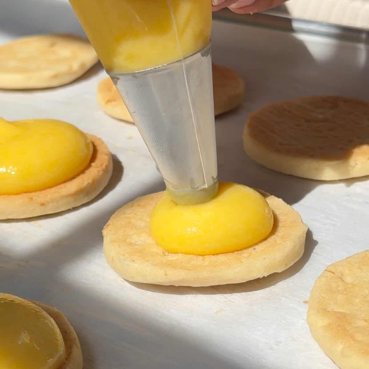 Dolloping cookies with lemon curd.