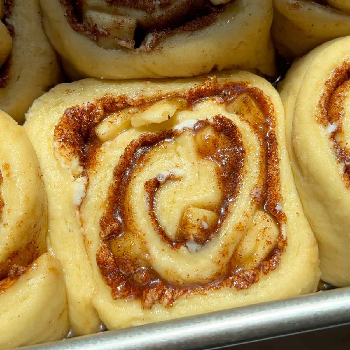 Banana Bread Cinnamon Rolls fluffy and unbaked.