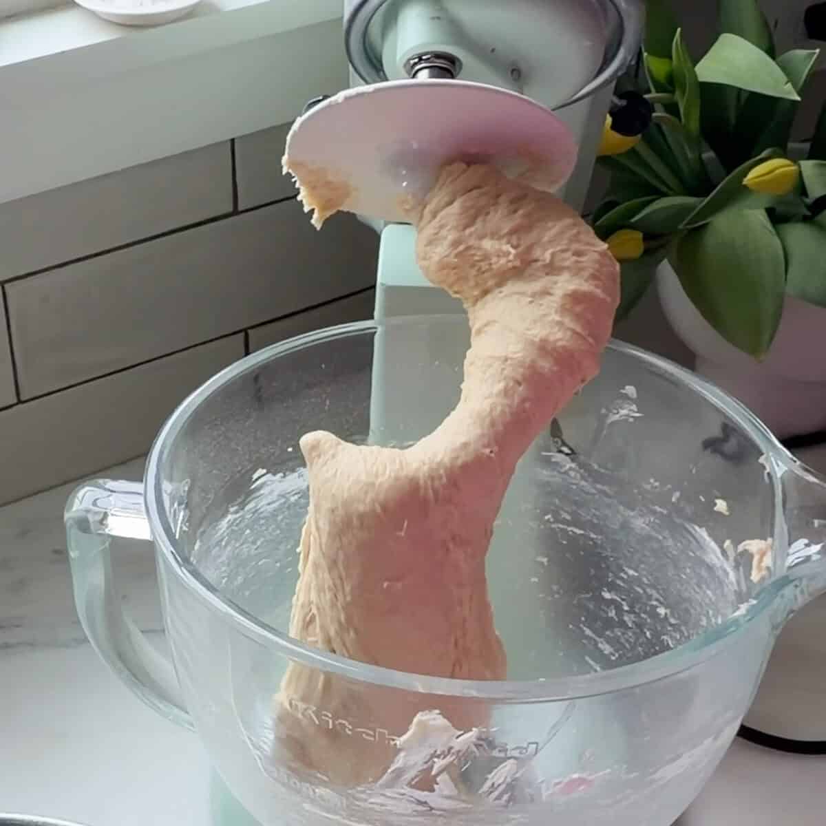 Banana Bread Cinnamon Roll dough in stand up mixer.