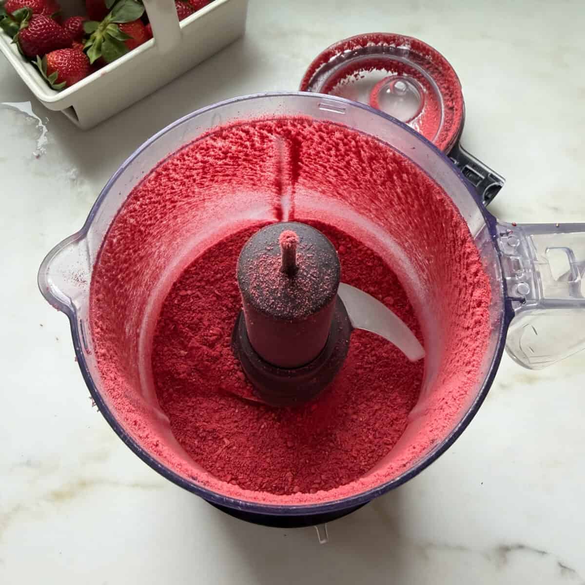 Freeze dried strawberry powder in food processor.