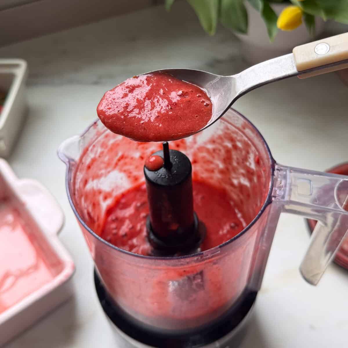 Roasted strawberry puree in food processor.