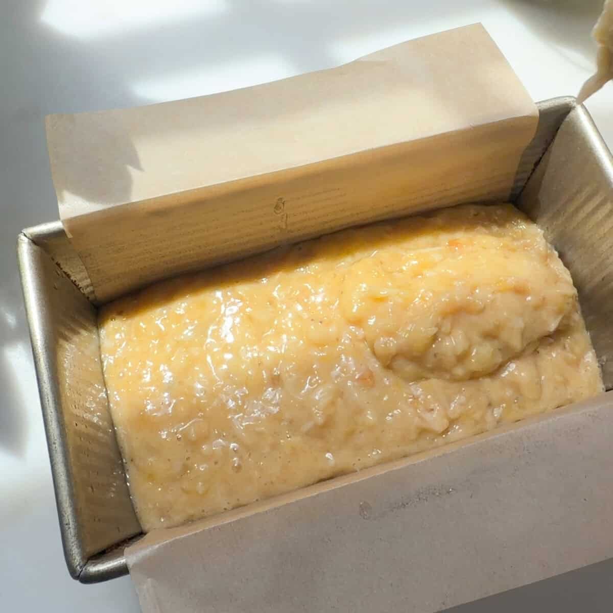 Tropical Banana Bread batter in baking pan.