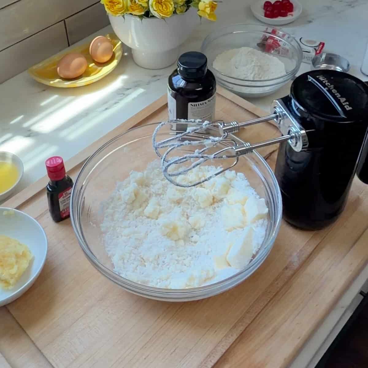 Butter and sugar in a bowl.