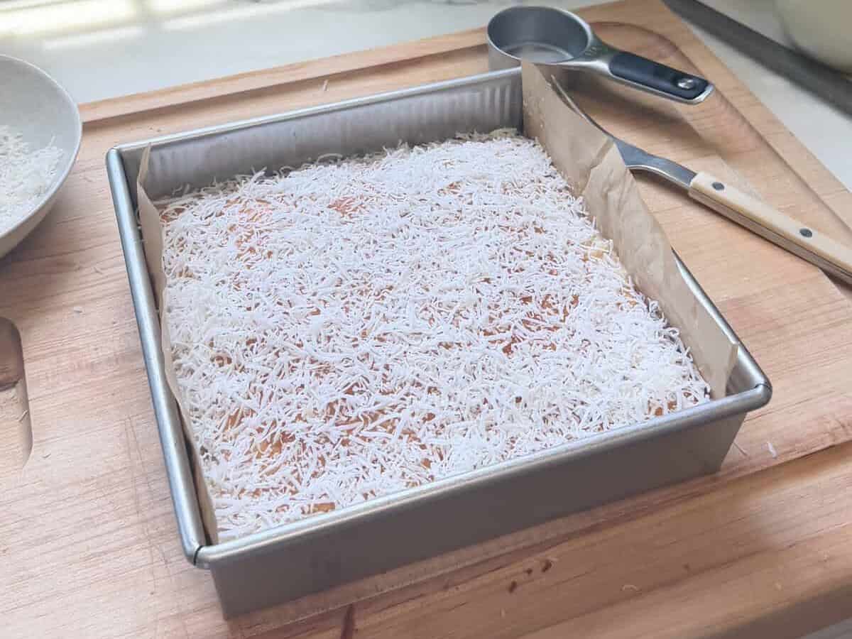 Bolo de Coco in a baking pan.