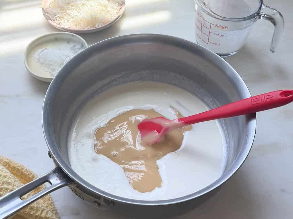 Milk and condensed milk in medium saucepan.