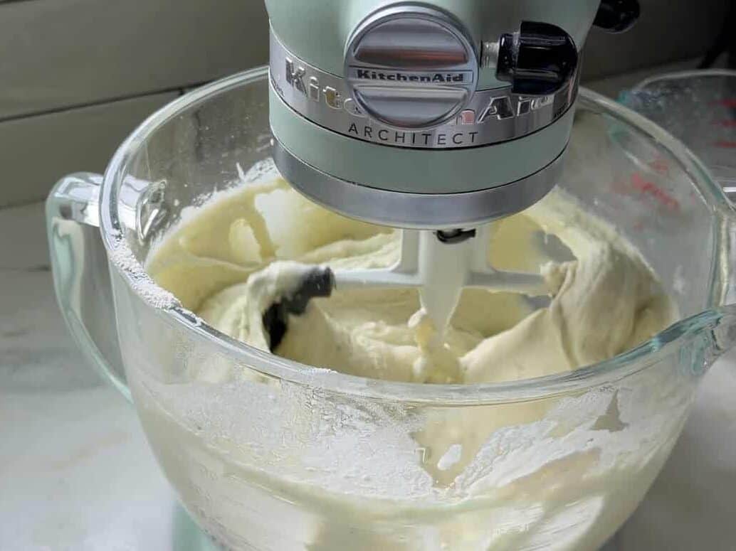 Mixing key lime cake batter in stand up mixer.