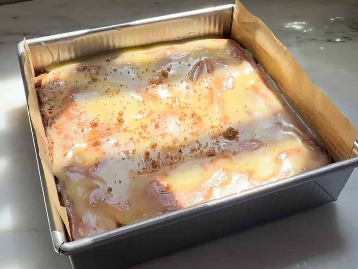 Glazed Peach Cobbler Brownies in baking pan.