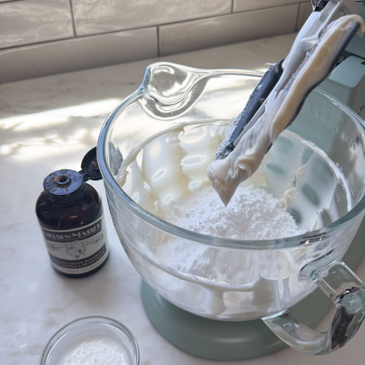 Powdered sugar added to frosting in stand up mixer.