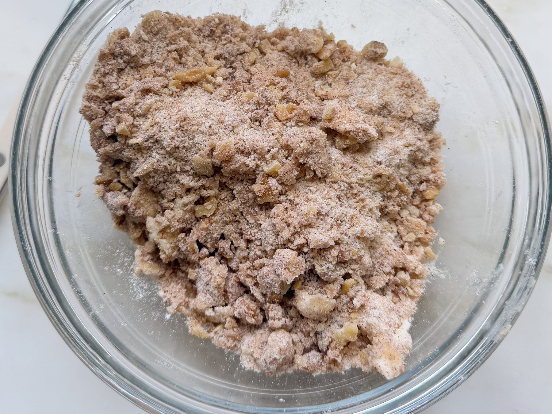 Walnut streusel in small bowl.