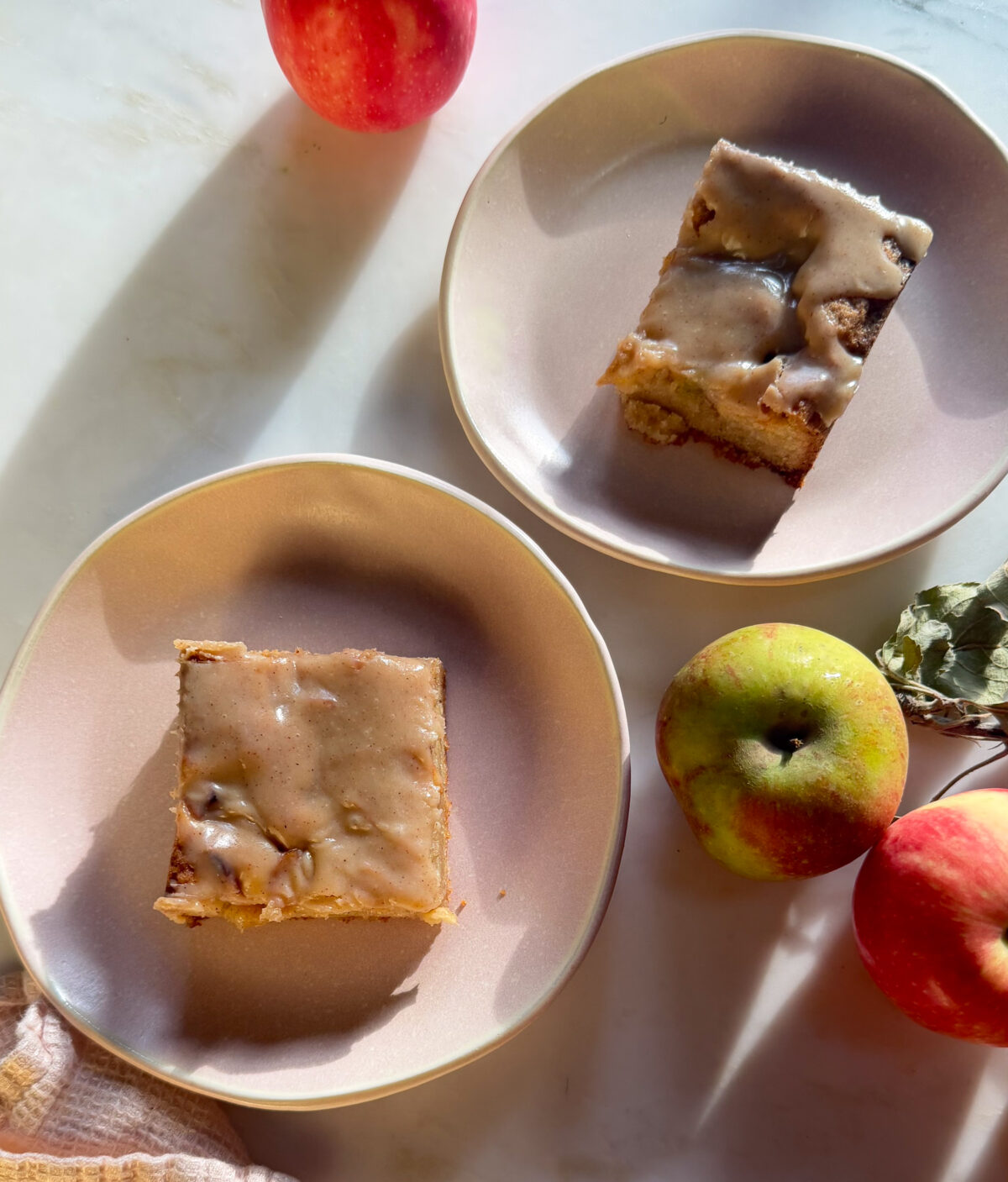 Apple fritter brownies on small plates.