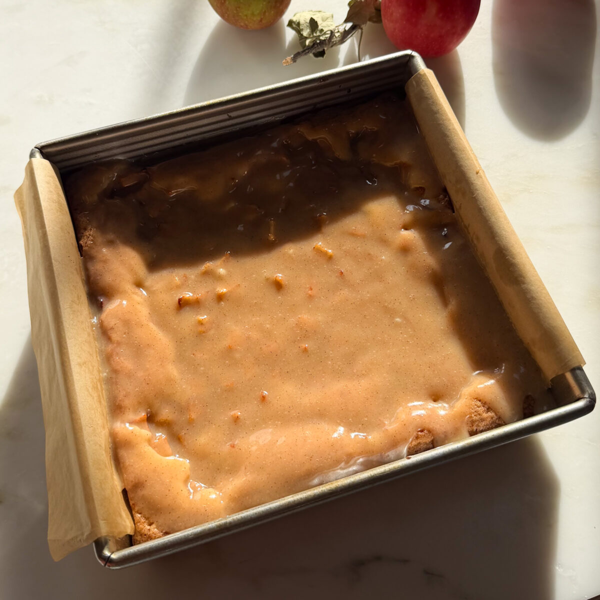 Glazed apple fritter brownies in baking pan.