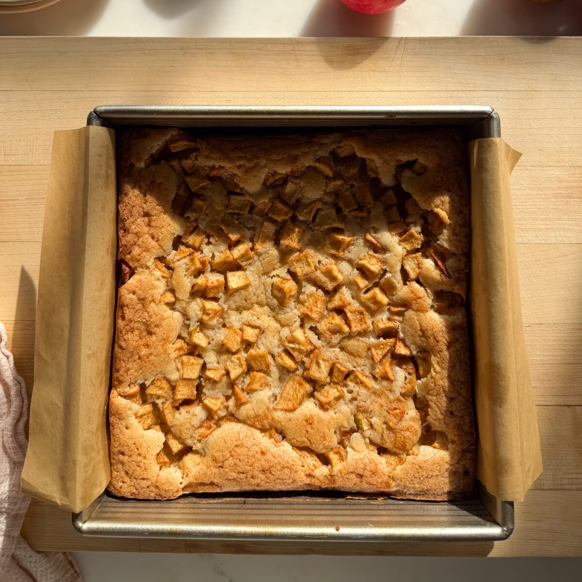 Baked apple fritter brownies in baking pan.
