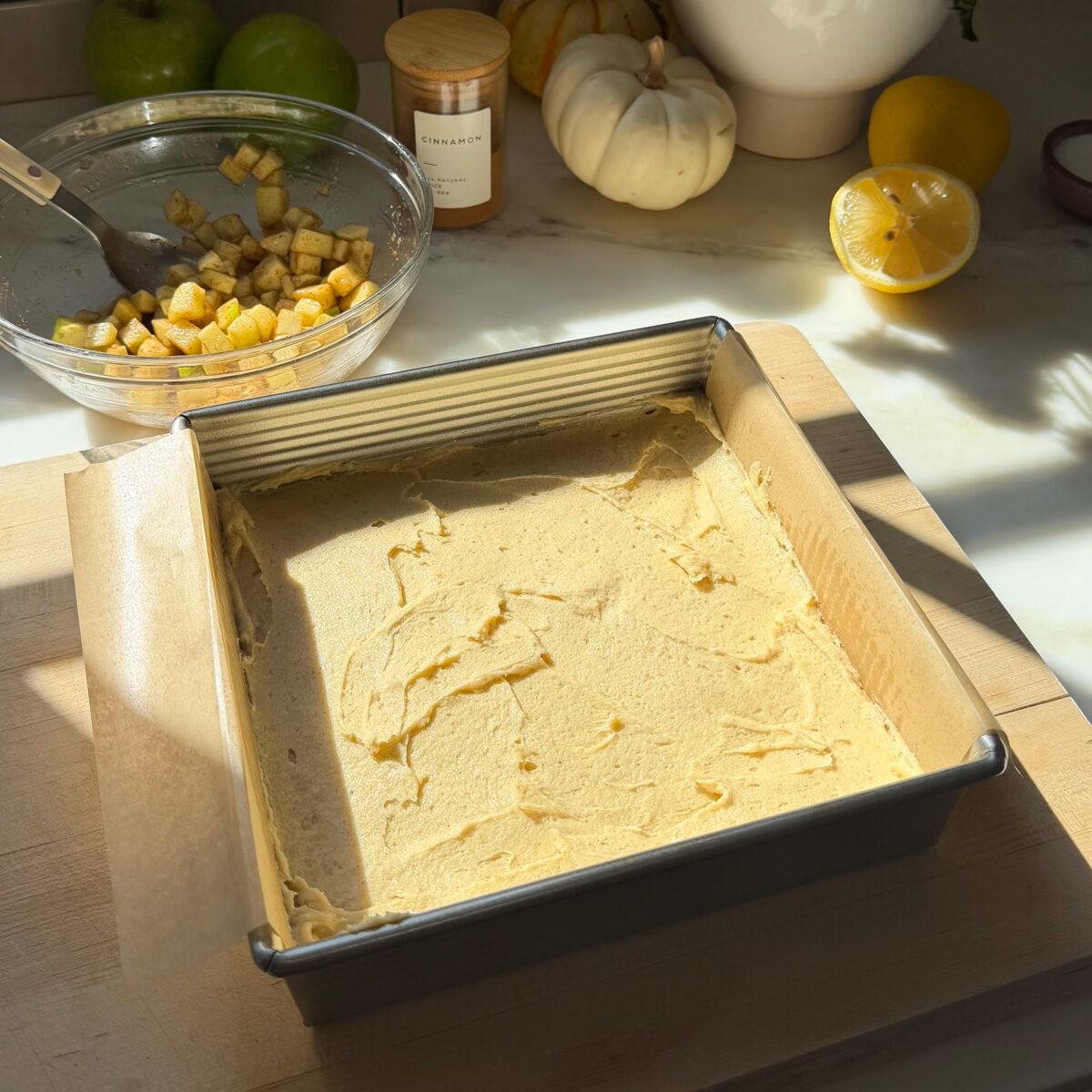 Batter evenly spread in baking pan.