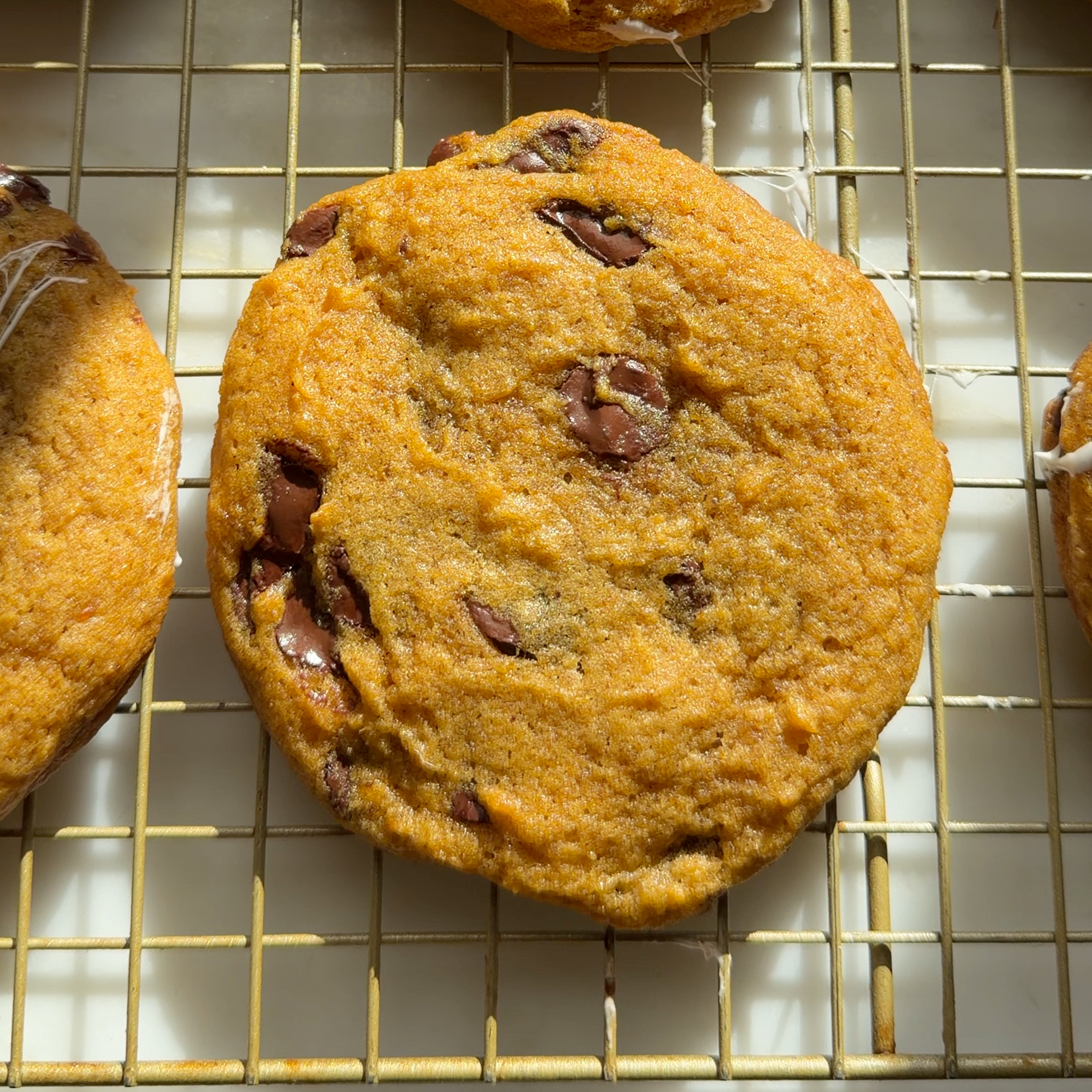 Fresh baked cookies on cooling rack.