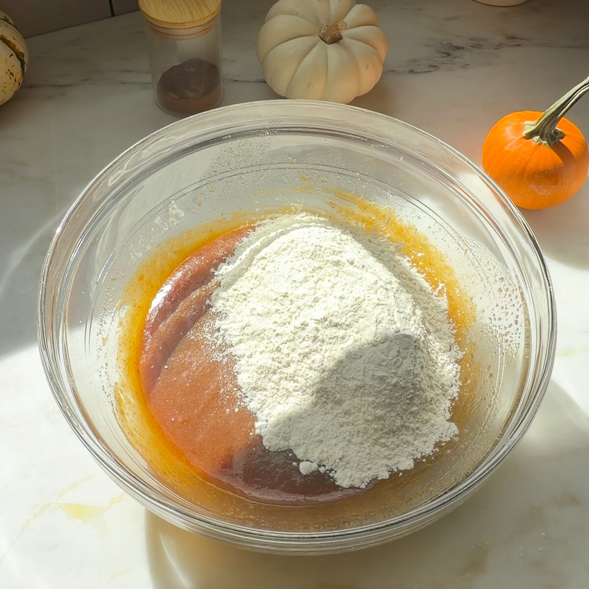 Wet batter with flour on top.