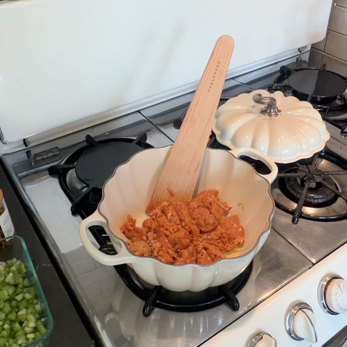 Sausage browning in soup pot.